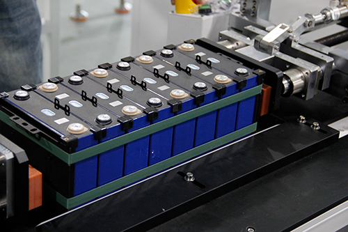 Battery stacking and pressing machine