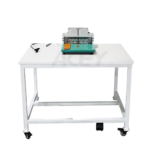 Pouch cell tab cutting machine